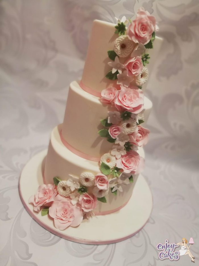 Romantic wedding cake with sugar flowers