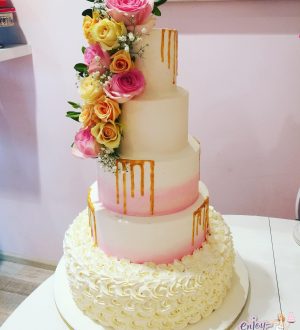 Pink blush goldendripp wedding cake