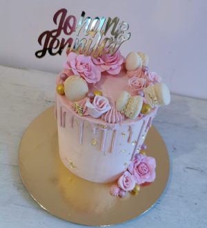 Pink en gold drip cake