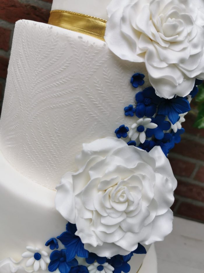 Gold and blue fondant wedding cake