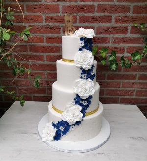 Gold and blue fondant wedding cake