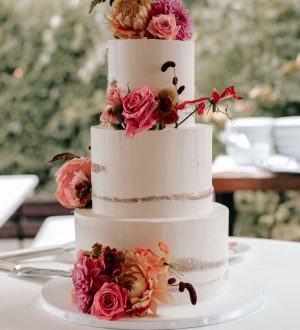 Semi naked cake with pink flowers