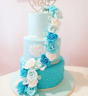 Blue fondant cake with fondant roses