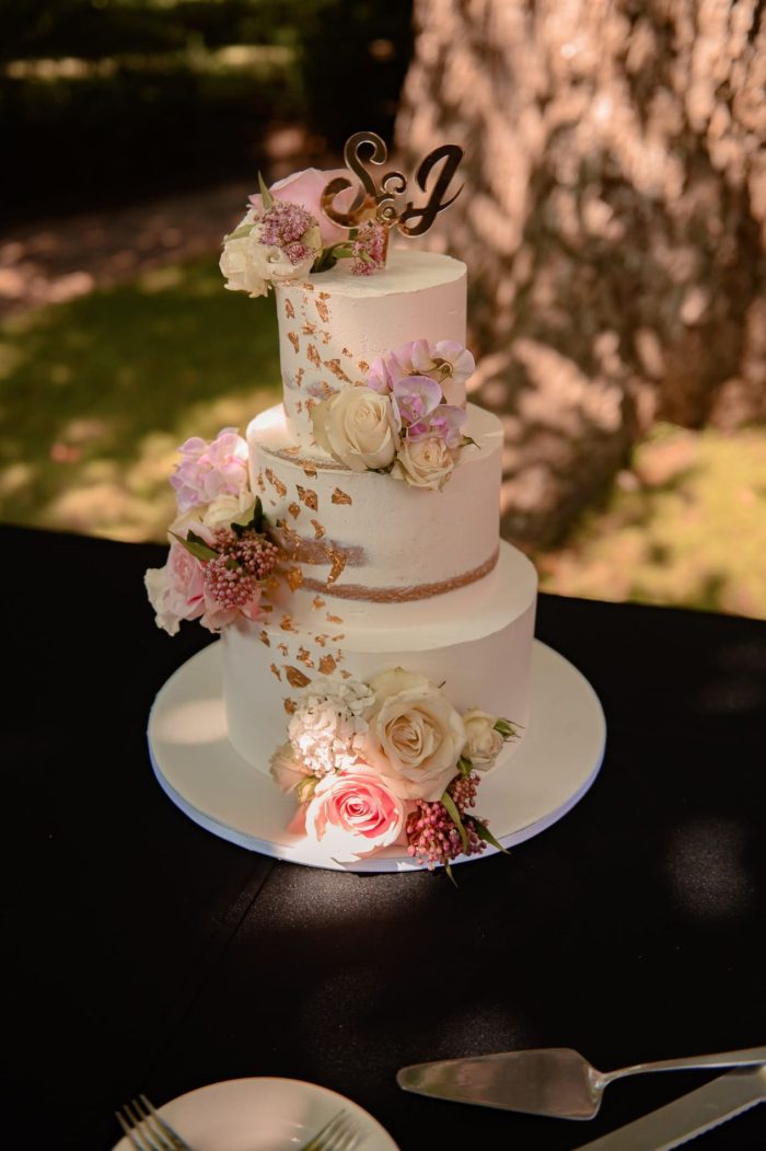 Semi naked cake with gold and flowers