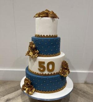 Navy blue & gold roses cake