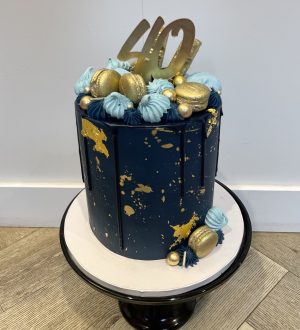 Navy blue and gold birthday cake