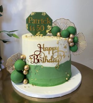 Green and gold birthday cake