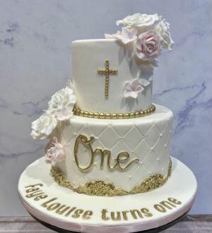 Doop taart met fondant bloemen en gouden accenten