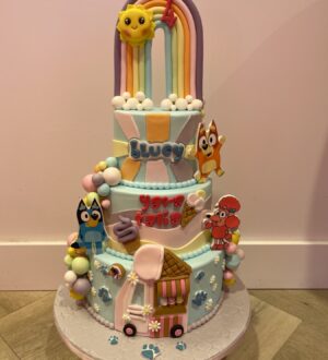 Bluey regenboog ijscowagen taart Bluey regenboog ijscowagen taart